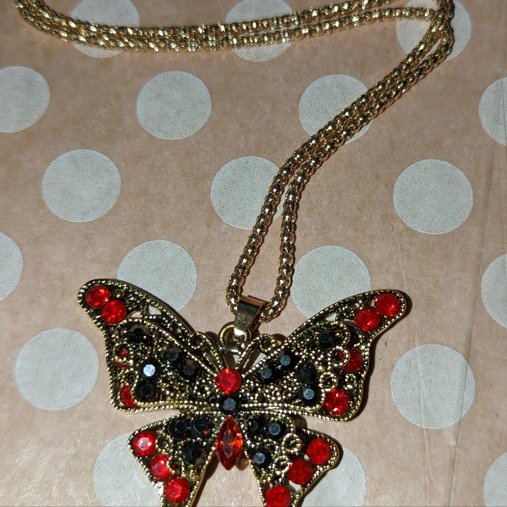 Beautiful gold and red Butterfly necklace